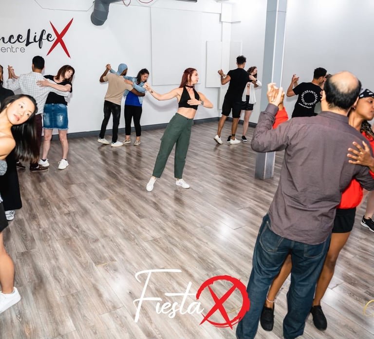 Dancers practicing together at DanceLifeX